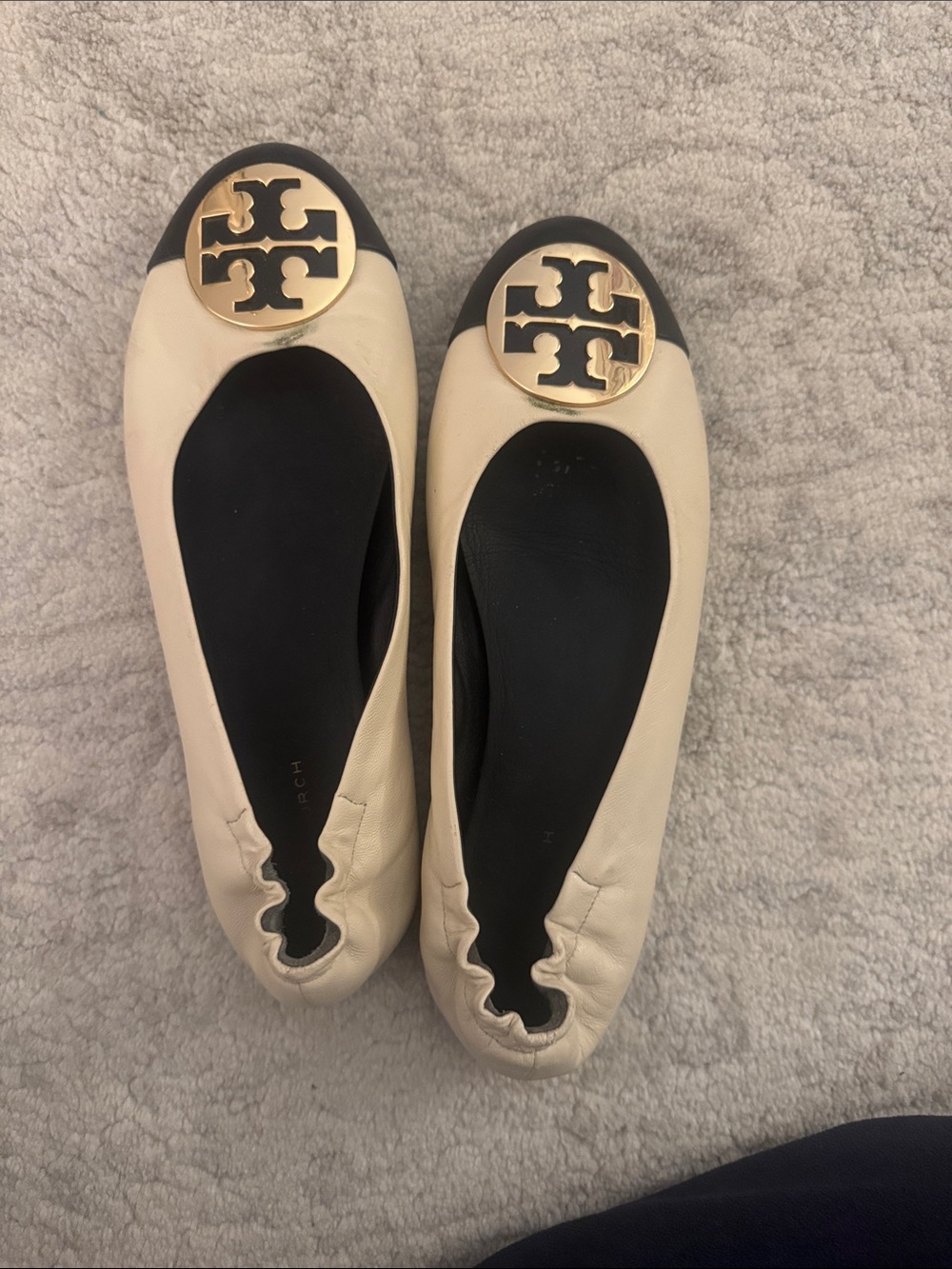 Tory Burch Cream Leather Ballet Flats with Black Cap Toe and Gold Logo